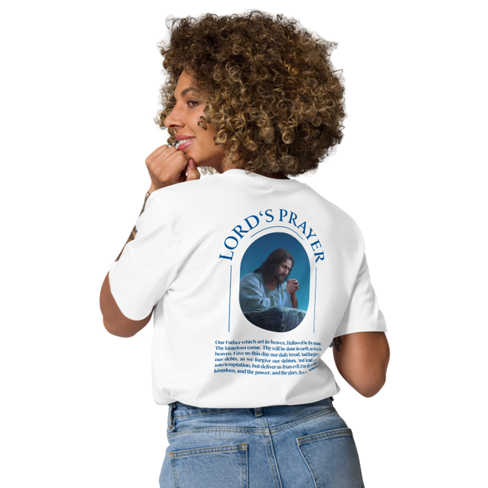 chrsitian-shirt-with-lord-prayer Woman wearing Christian shirt with a portrayal of Jesus Christ praying and the Lords Prayer from the Bible on the back.